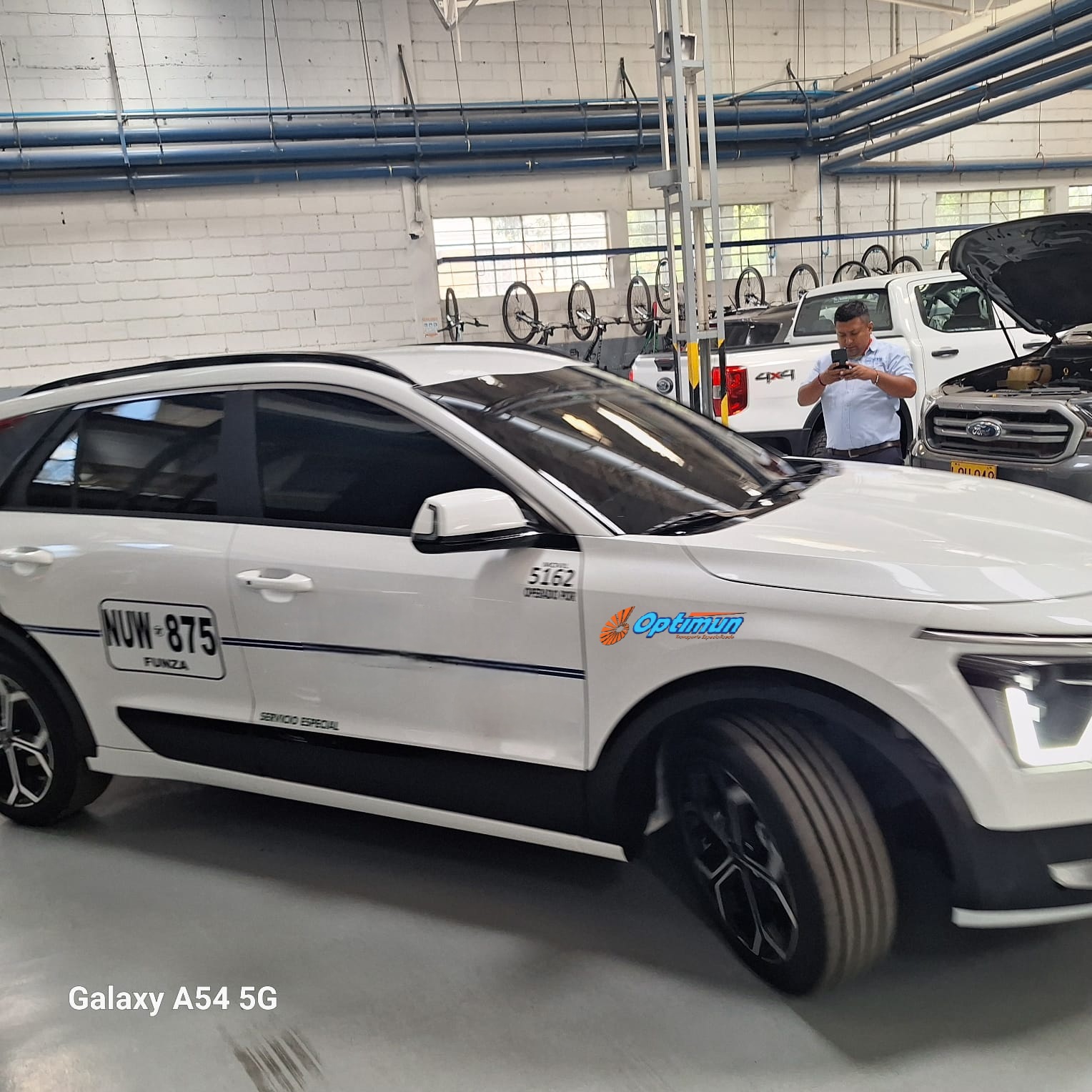 carro con logo optimun2